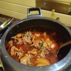 A picture of Mutton aloo Curry desi style.