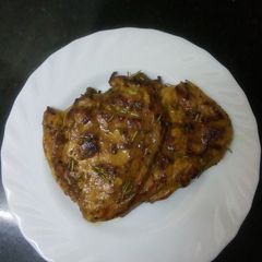 A picture of Pan fried chicken breast.