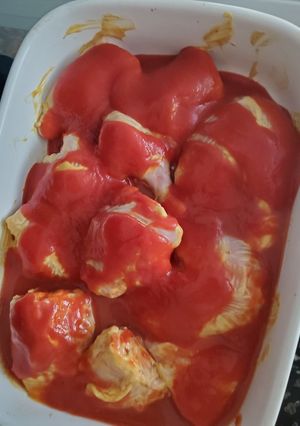 A picture of Chicken in sauce.