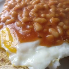 A picture of Punjabi Beans with egg on toast.