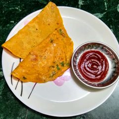 A picture of Masala Besan Chilla with Thin Crust.