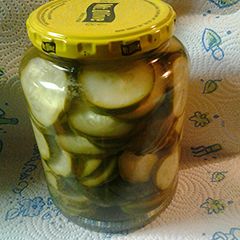 A picture of Kosher chips, pickles.