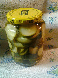 A picture of Kosher chips, pickles.