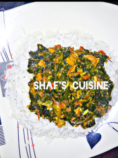 A picture of White rice with vegetable soup.