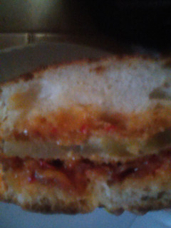 A picture of Fried green tomato pimento cheese BLT.