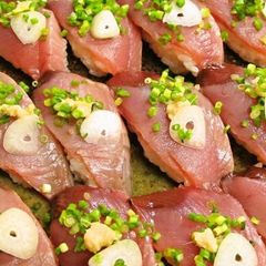 A picture of Bonito Nigiri Sushi.
