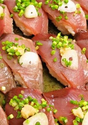 A picture of Bonito Nigiri Sushi.