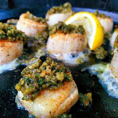 A picture of Smoky seared scallops with pesto.