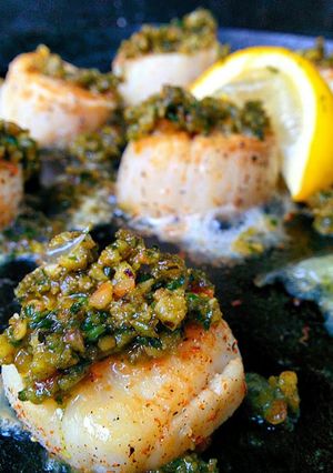 A picture of Smoky seared scallops with pesto.