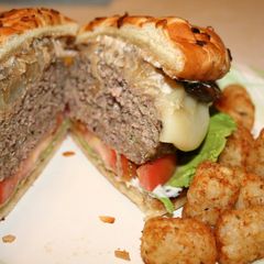 A picture of Mushroom Quinoa Burgers with Roasted Garlic & Thyme Mayonnaise.