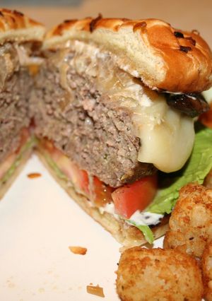 A picture of Mushroom Quinoa Burgers with Roasted Garlic & Thyme Mayonnaise.