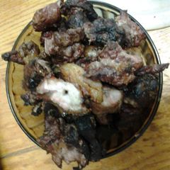 A picture of Espetada (Meat on a stick).