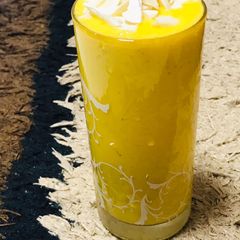 A picture of Mangoes cardamom lassi.