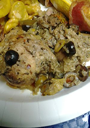 A picture of Tagine style chicken with preserved lemons.