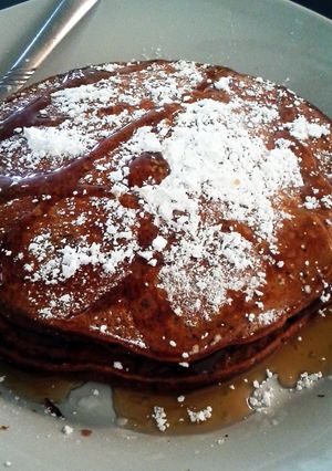 A picture of Chocolate Peanut Butter Banana Pancakes.