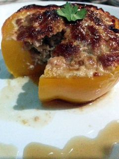 A picture of Bellpepper with pork in the oven.