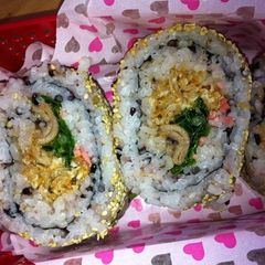 A picture of Korean-style Spicy California Rolls with Five Grain Rice.