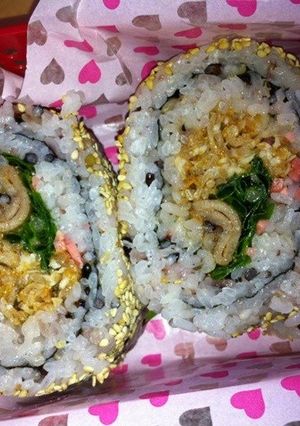 A picture of Korean-style Spicy California Rolls with Five Grain Rice.