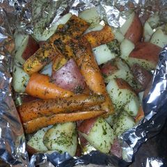 A picture of Roasted Potatoes with Carrots.