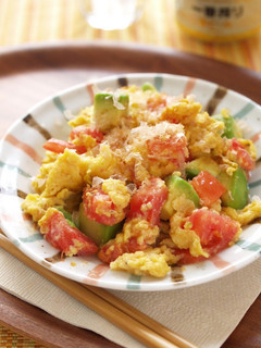 A picture of White Miso Scrambled Eggs with Tomato and Avocado.