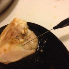 A picture of Checking Meat With a Cake Tester.