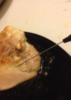 A picture of Checking Meat With a Cake Tester.
