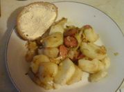A picture of fried cabbage and potato