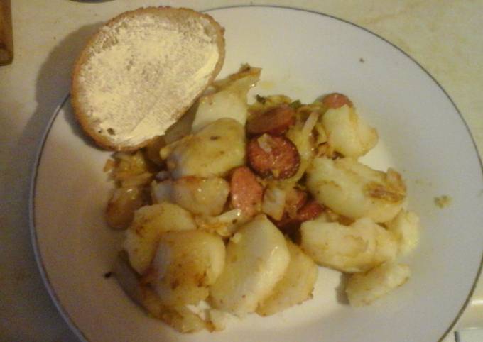 Cabbage with fried potatoes and smoked sausage