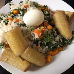 Unripe plantain with veggie rice A picture of Unripe plantain with veggie rice.