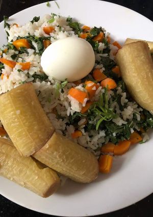 A picture of Unripe plantain with veggie rice.