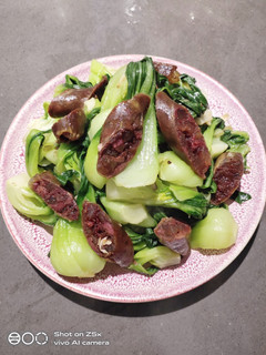 A picture of Bak choy with Chinese Sausage.