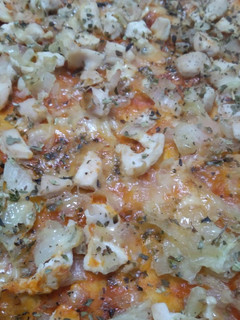Una foto de Pizza de pollo