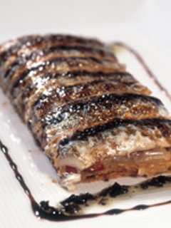 Una foto de Coca de escalibada con boquerones