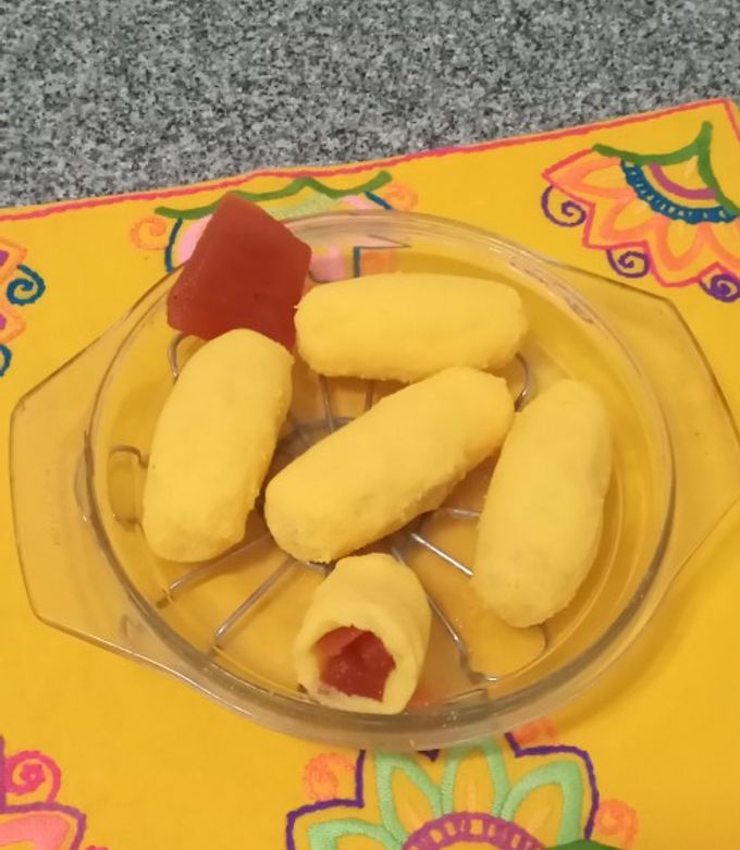 Una foto de Croquetas de polenta rellenas con dulce de membrillo