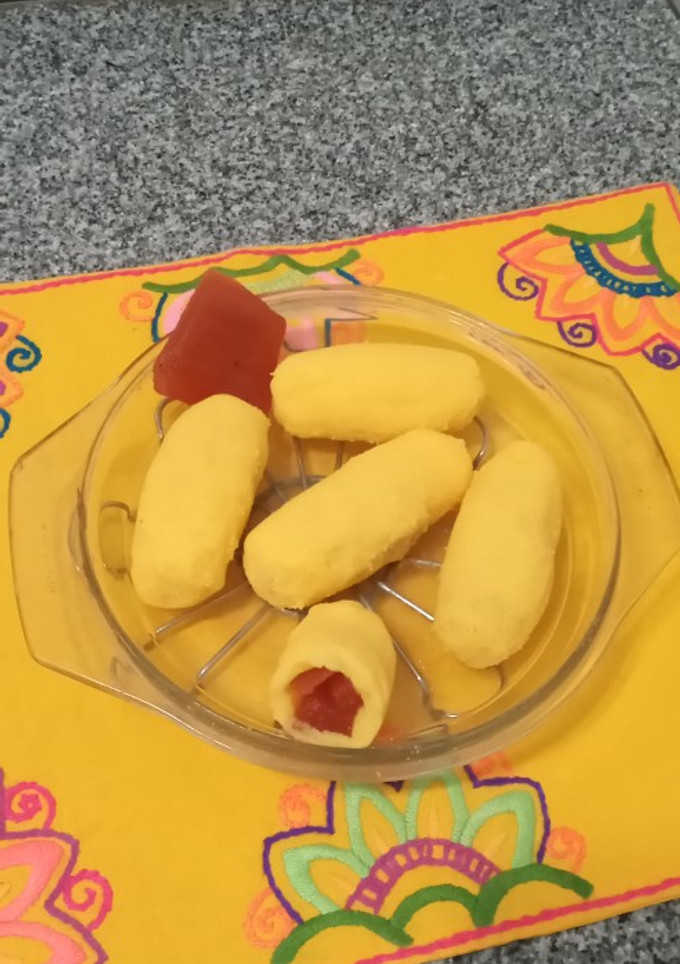 Una foto de Croquetas de polenta rellenas con dulce de membrillo