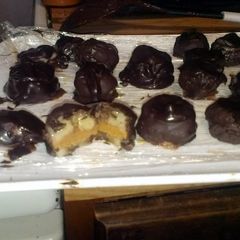 A picture of Chocolate dipped Peanut butter and banana sandwiches.