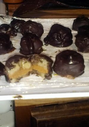 A picture of Chocolate dipped Peanut butter and banana sandwiches.