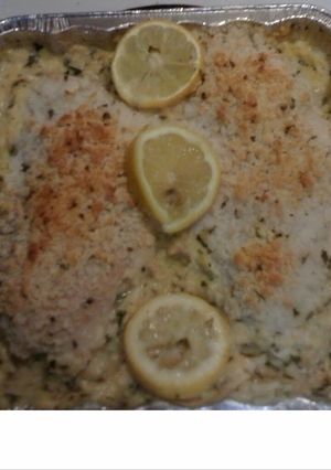 A picture of lemon chicken and herb rice.