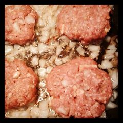 A picture of Onion fried beef patties.