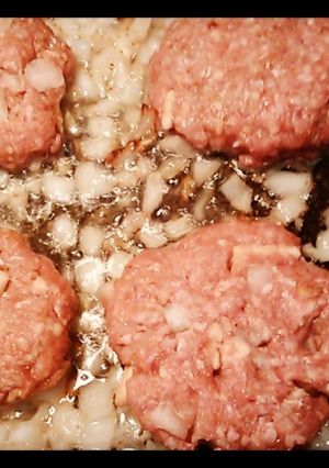 A picture of Onion fried beef patties.
