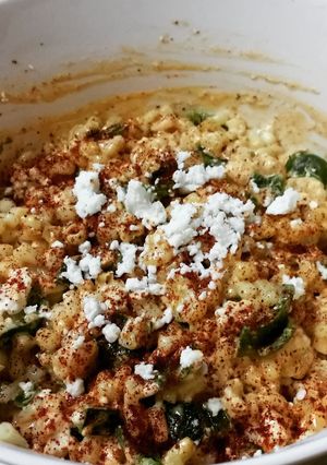 A picture of Mexican style street corn.