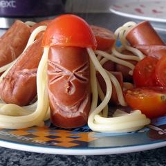 A picture of Children's Hotdog men with tomato hats.