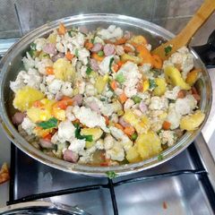 A picture of Unripe plantain with fresh veggies.