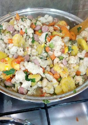 A picture of Unripe plantain with fresh veggies.