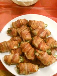 A picture of Ground Pork and Cheese Stuffed Jalapeño Peppers Wrapped in Bacon.