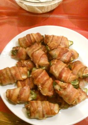 A picture of Ground Pork and Cheese Stuffed Jalapeño Peppers Wrapped in Bacon.