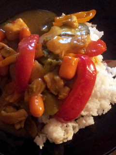 A picture of Sweet & sour Chicken curry stir fry W/ rice.