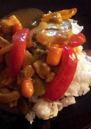 A picture of Sweet & sour Chicken curry stir fry W/ rice.