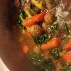 A picture of mini meatball beef soup.