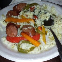 A picture of Rice with sausage and peppers.